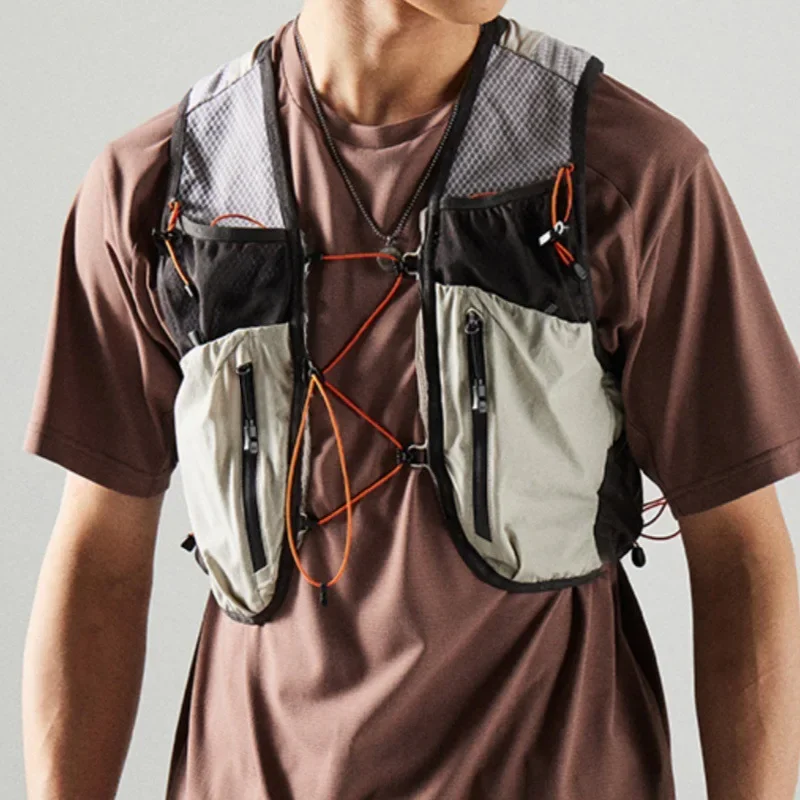 เสื้อกั๊กน้ำหนักเบาสำหรับเดินป - Outdoor Adventure Vest บทวิจารณ์และราคา